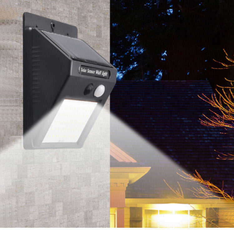 4個セット 防犯対策 人感センサーライト 配線なし・電池いらず ソーラー充電式 夜間 8灯LEDセンサーライト IP65 防水仕様 玄関ライト(代引不可)
