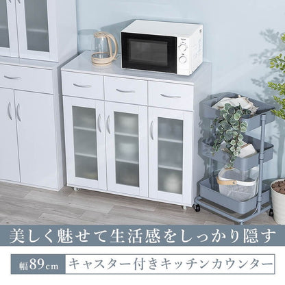 鏡面仕上げ キャスター付き キッチンカウンター 幅89cm ベル カウンター ガラス扉 レンジ台 カップボード キッチンキャビネット レンジ台 キッチン収納(代引不可)